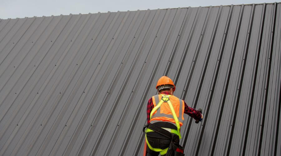 Professional metal roof installation services in Ely, IA